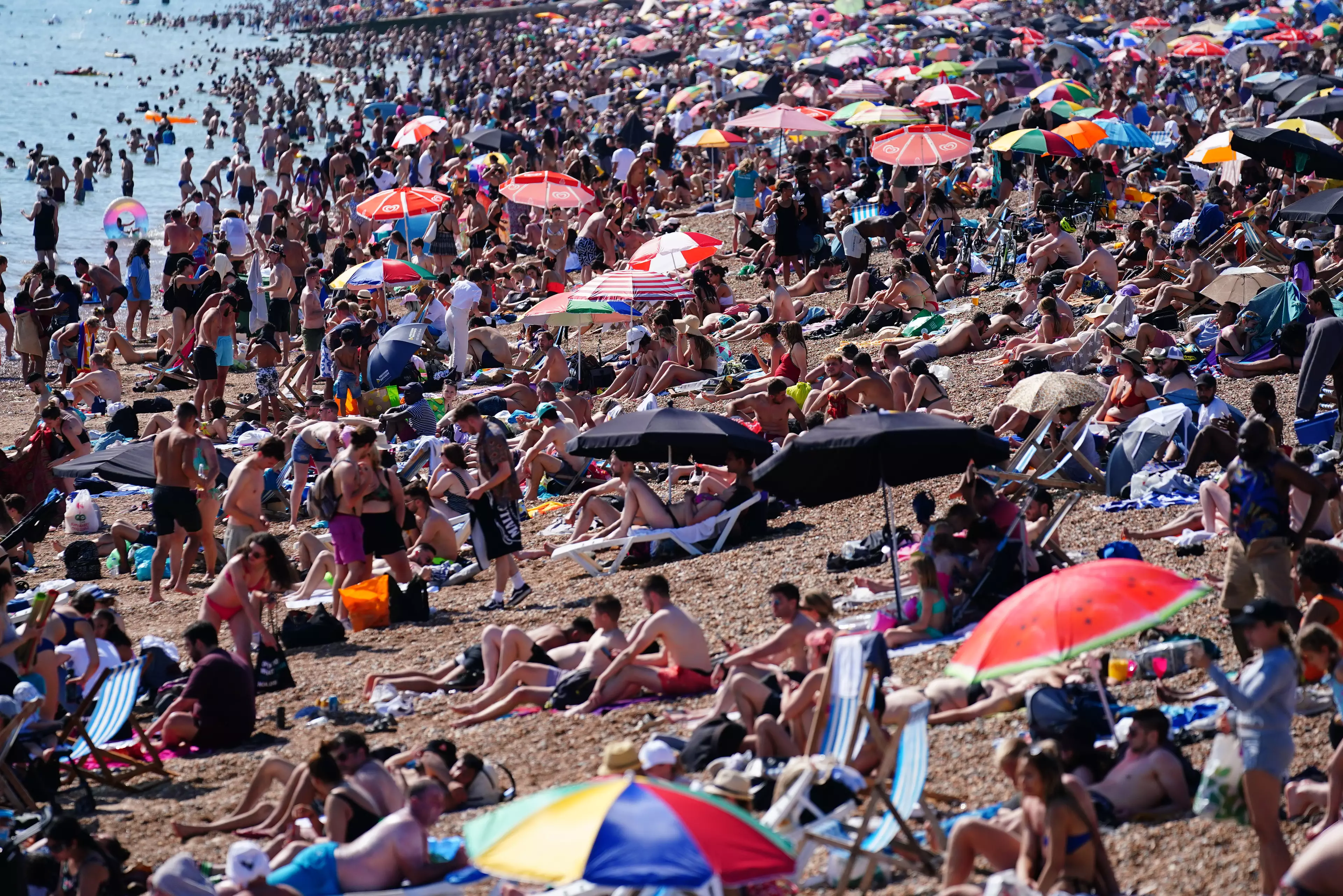 People enjoying the hot weather in Brighton on Sunday.