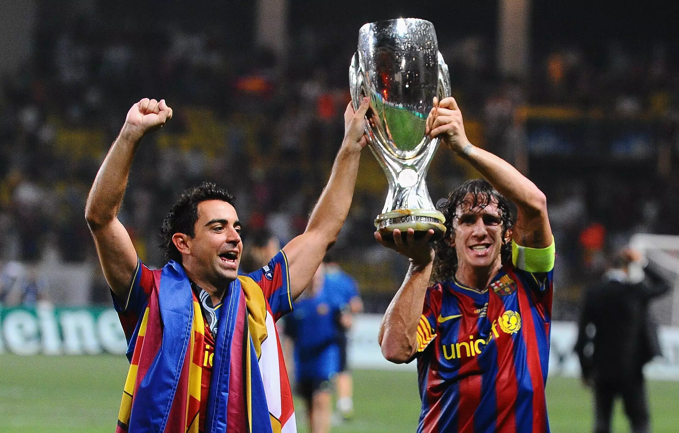 Puyol lifts the European Super Cup. Image: PA Images