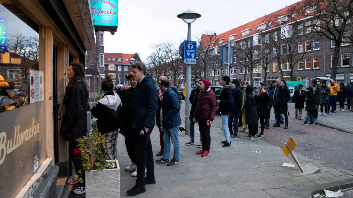 Long Queues Form Outside Amsterdam's Coffee Shops As Government Announces Closures 