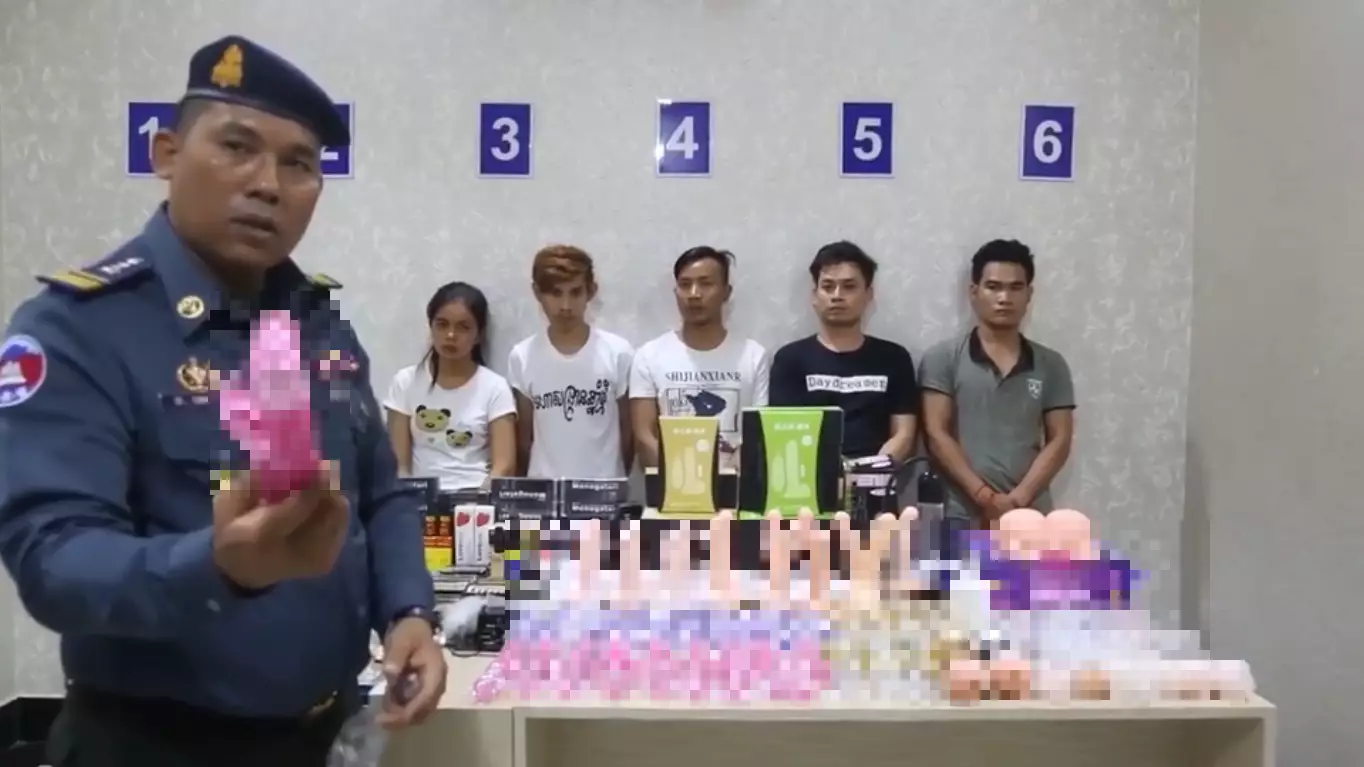 'Sex Toy Gang' Paraded In Front Of Dildos In Bizarre Police Video