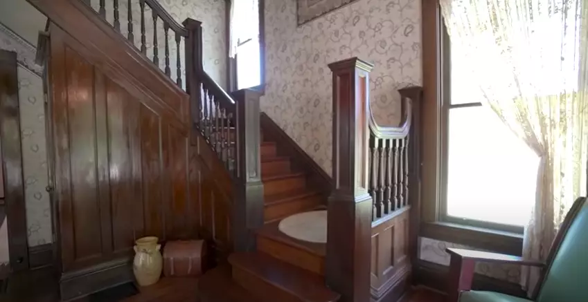The house retains many of the original hardwood floors and period features (