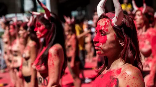 Animal Rights Activists Stage Topless Protest Against Bull Running In Pamplona