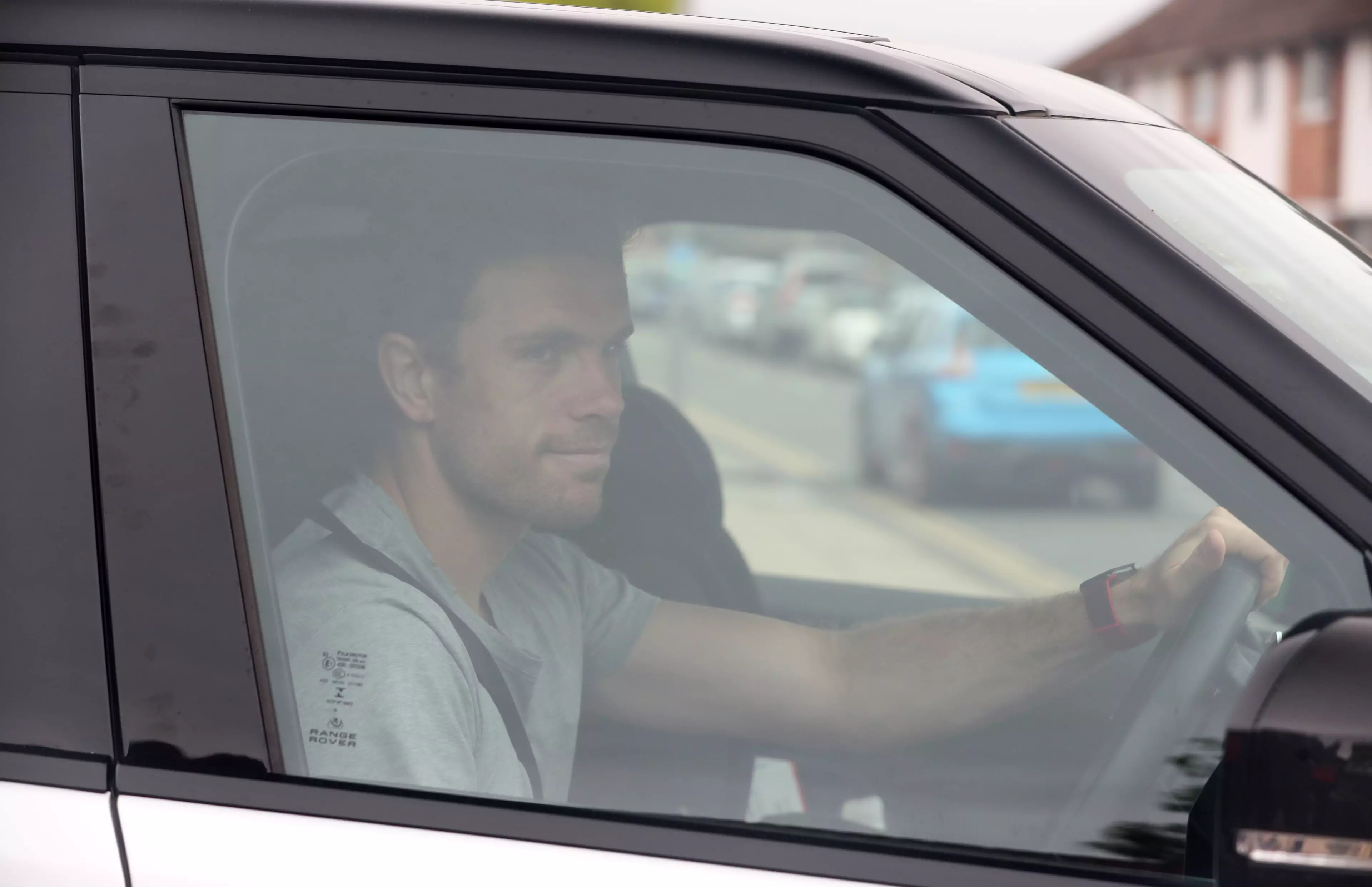 Jordan Henderson arrives at Liverpool training. Image: PA