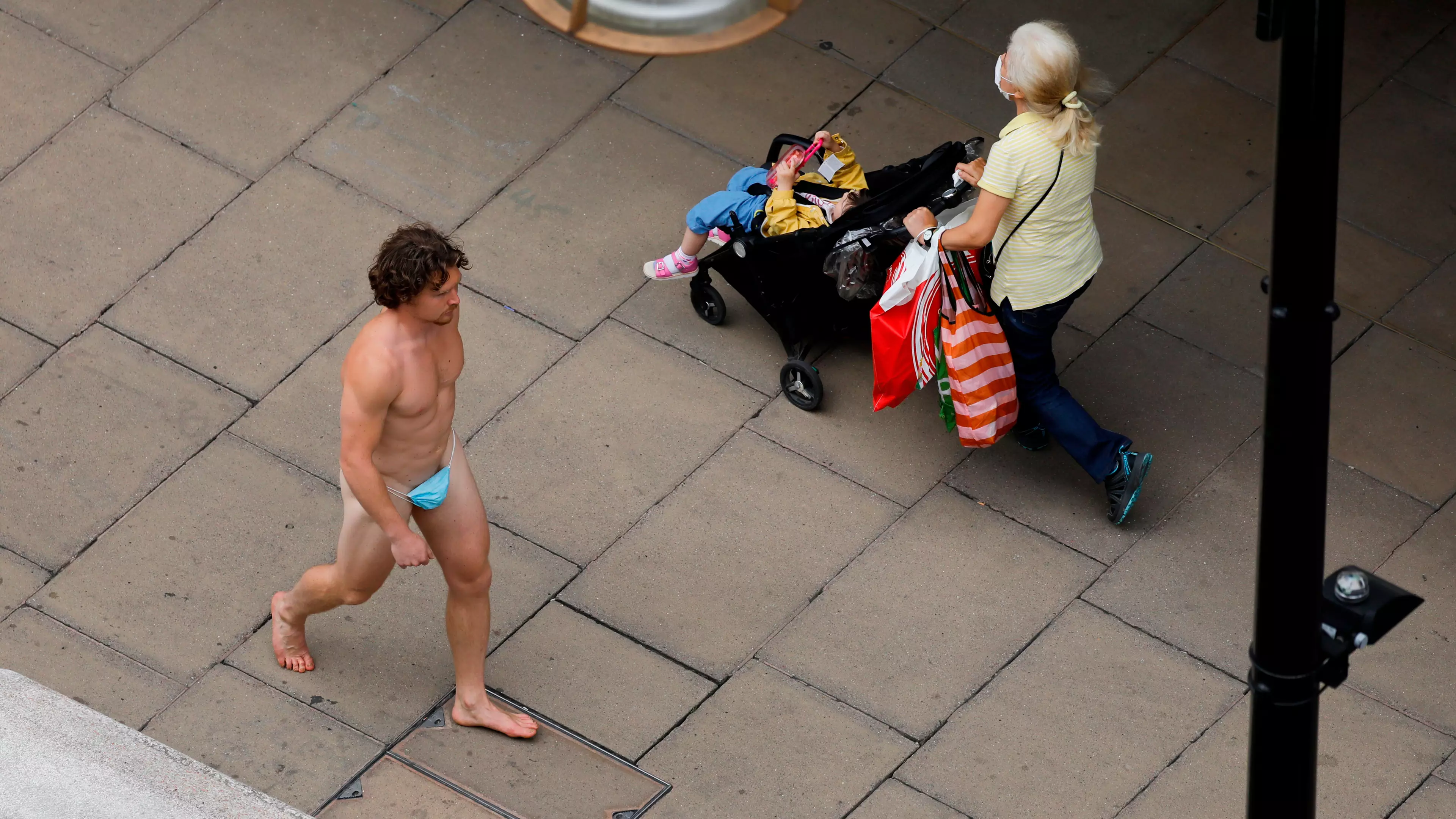 Man Walks Down Oxford Street In G-String Made Out Of Face Mask