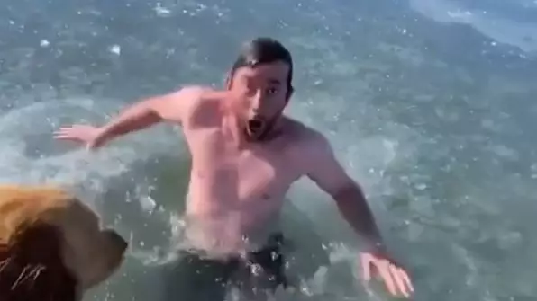 TikTok User 'Almost Dies' While Swimming Under Ice On Lake