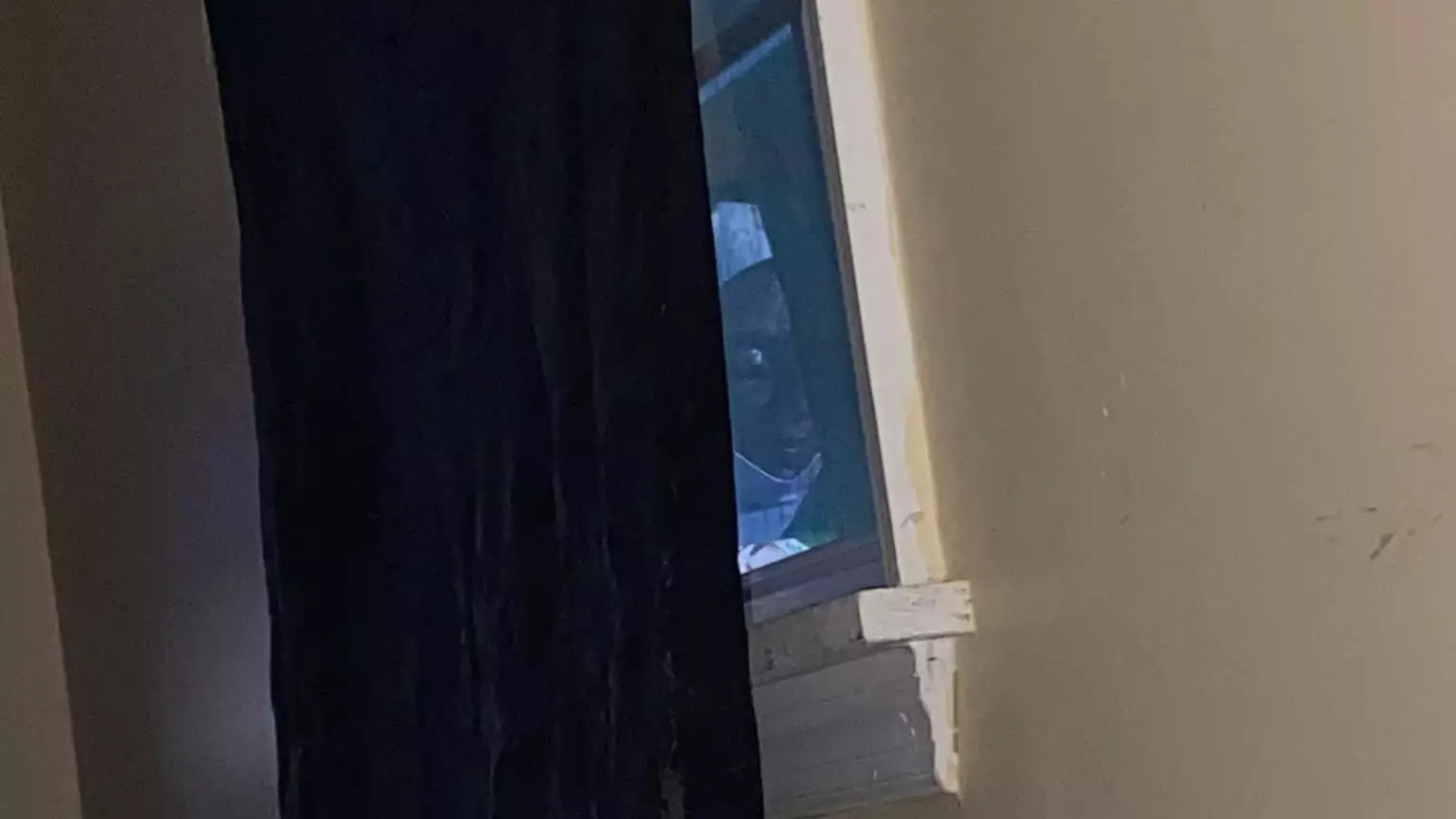 Woman Left Spooked After Seeing 'Haunting' Reflection In Window