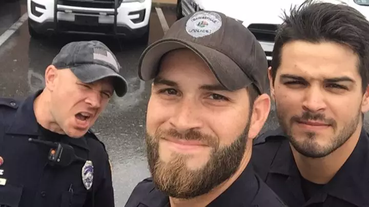 People Are Getting Thirsty Over This Picture Of Policemen Helping After Irma