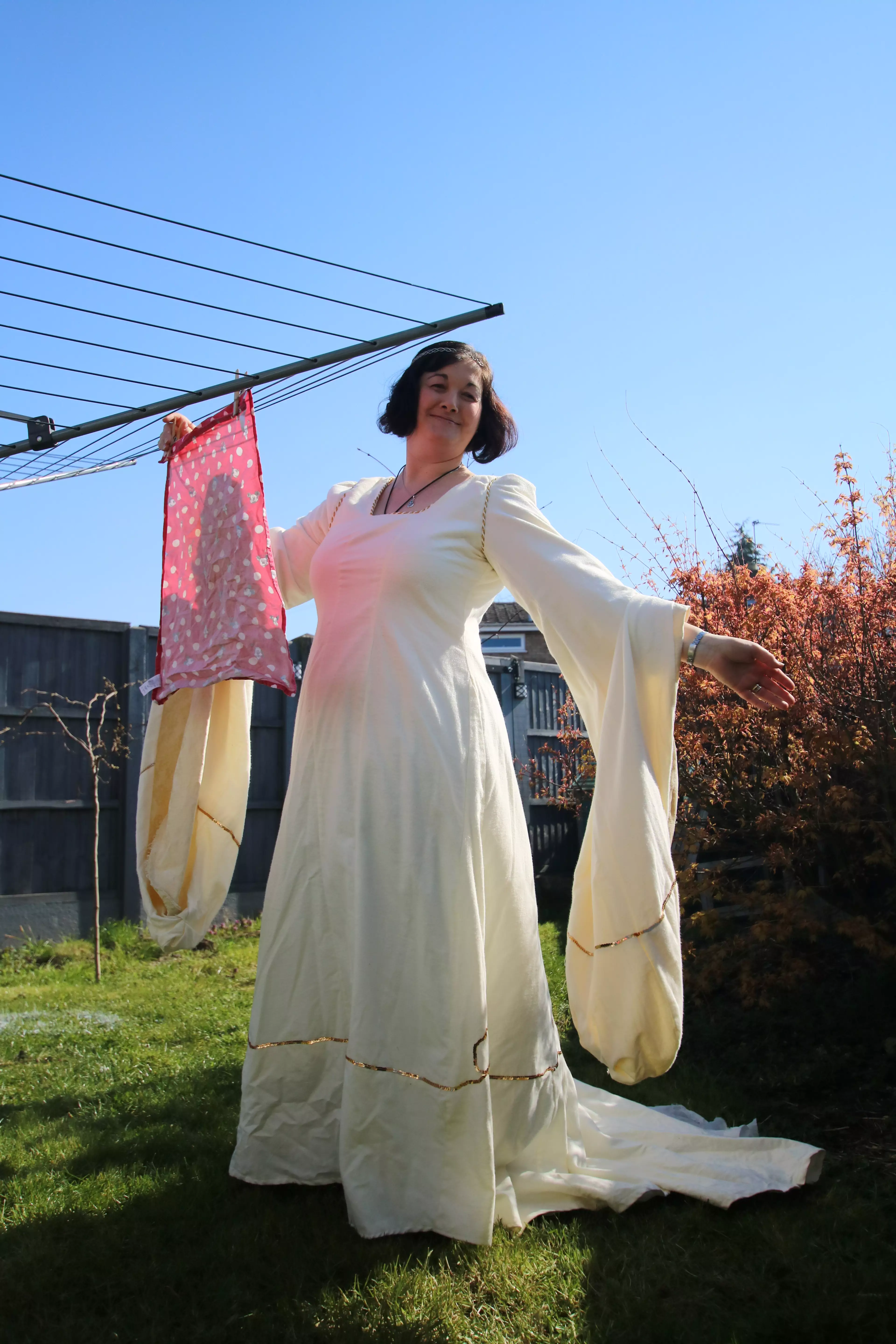 One woman wore a Medieval-style gown to hang out her laundry (