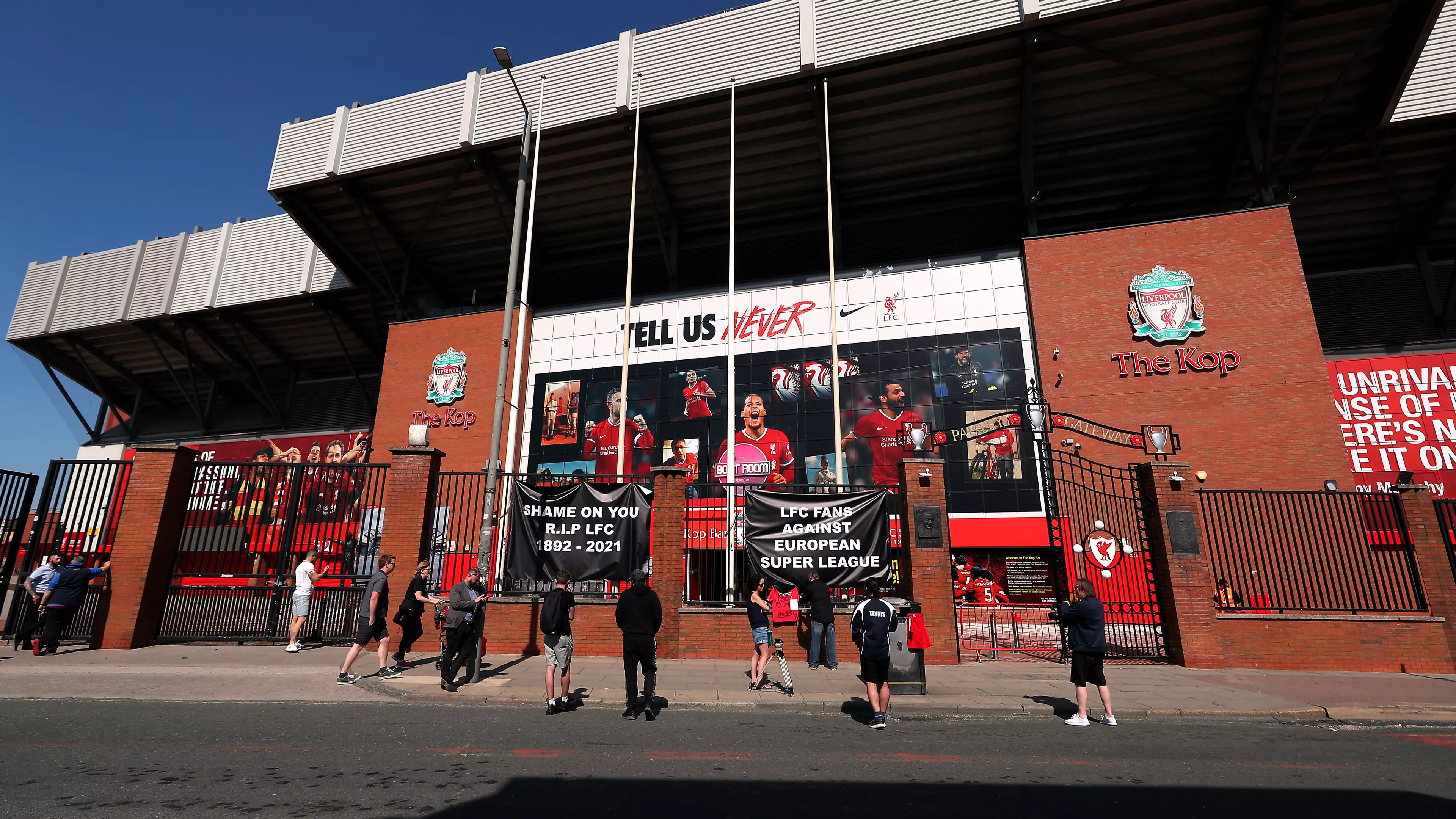 Liverpool Fans Put Up Banners Outside Of Anfield