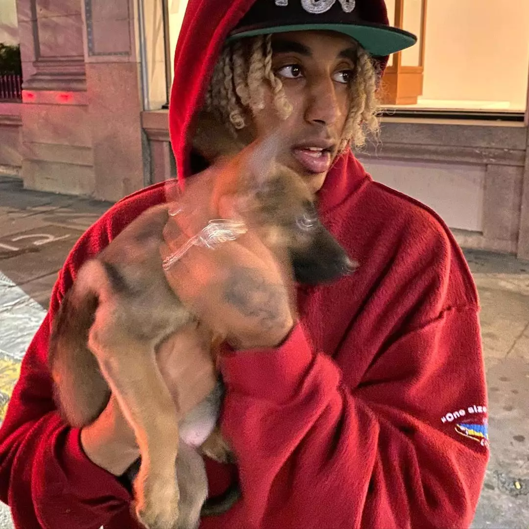 Rapper Glo Mula with his new dog.