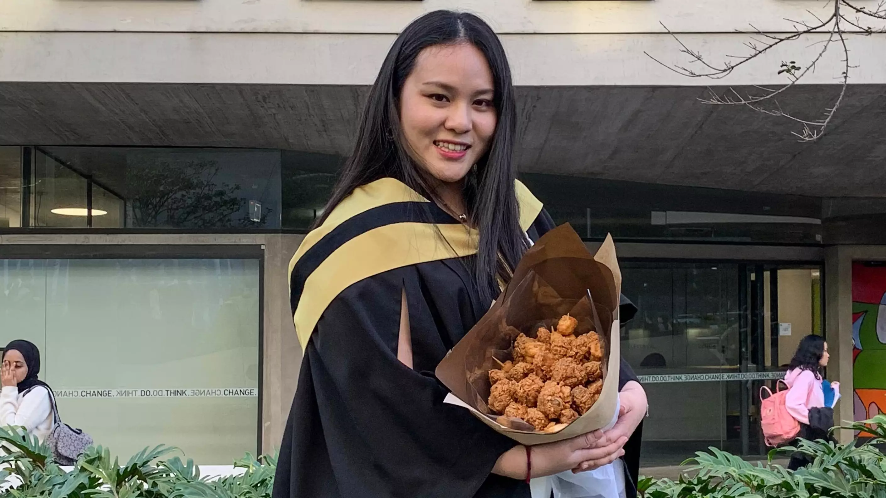 University Student Celebrates Graduation With Bouquet Of Popcorn Chicken Nuggets And Wings
