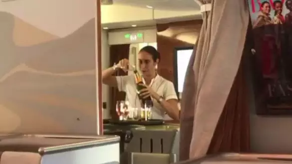 Emirates' Flight Attendant Filmed Pouring Champagne Back Into The Bottle 