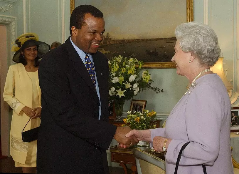 King Mswati meets the Queen of the United Kingdom in 2003.