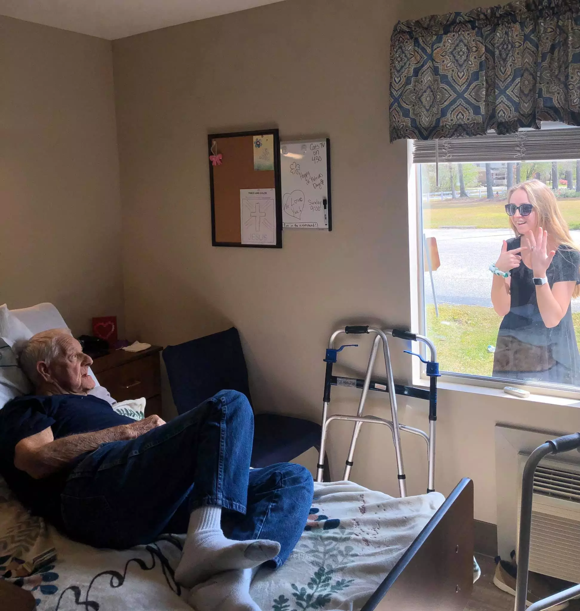 Carly surprised her grandad at his window to show him her engagement ring (
