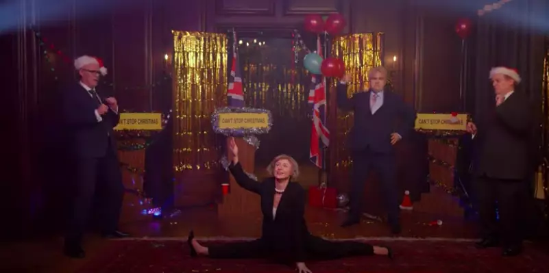 Theresa does the splits at one point (