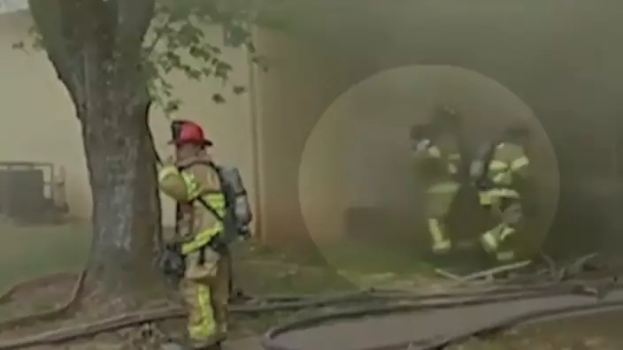 Firefighter Catches Baby Dropped From Burning Building In Dramatic Footage
