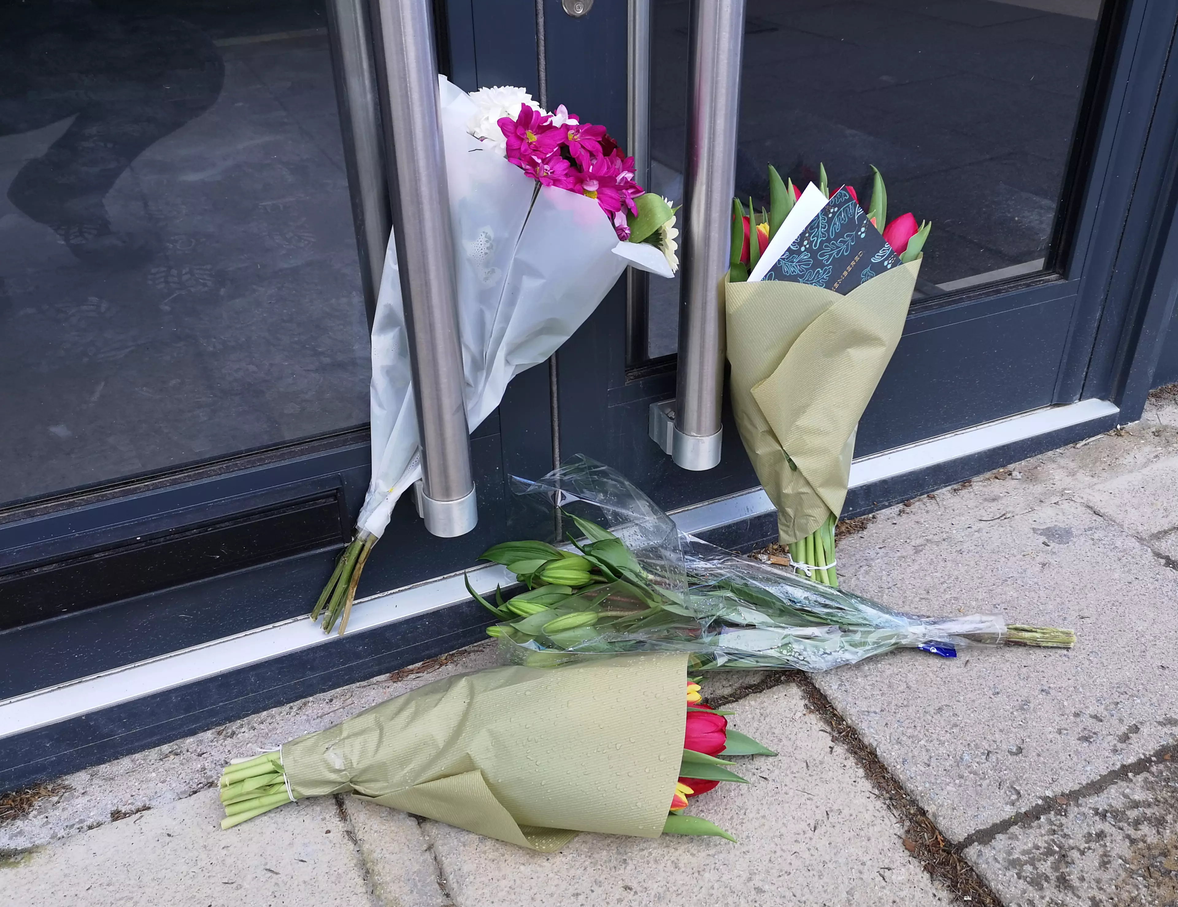 Tributes left outside the cafe that Mike Thalassitis planned to open.