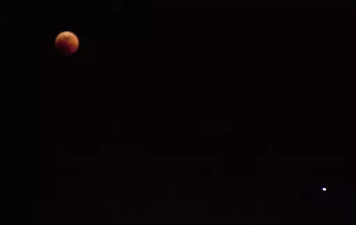 Blood moon with Mars on the bottom right (white dot) in Nairobi on Friday, July 27.