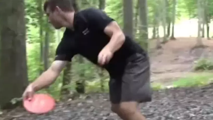 Watch This Disc Golfer Nail A 530-Foot Hole-In-One While Falling Over