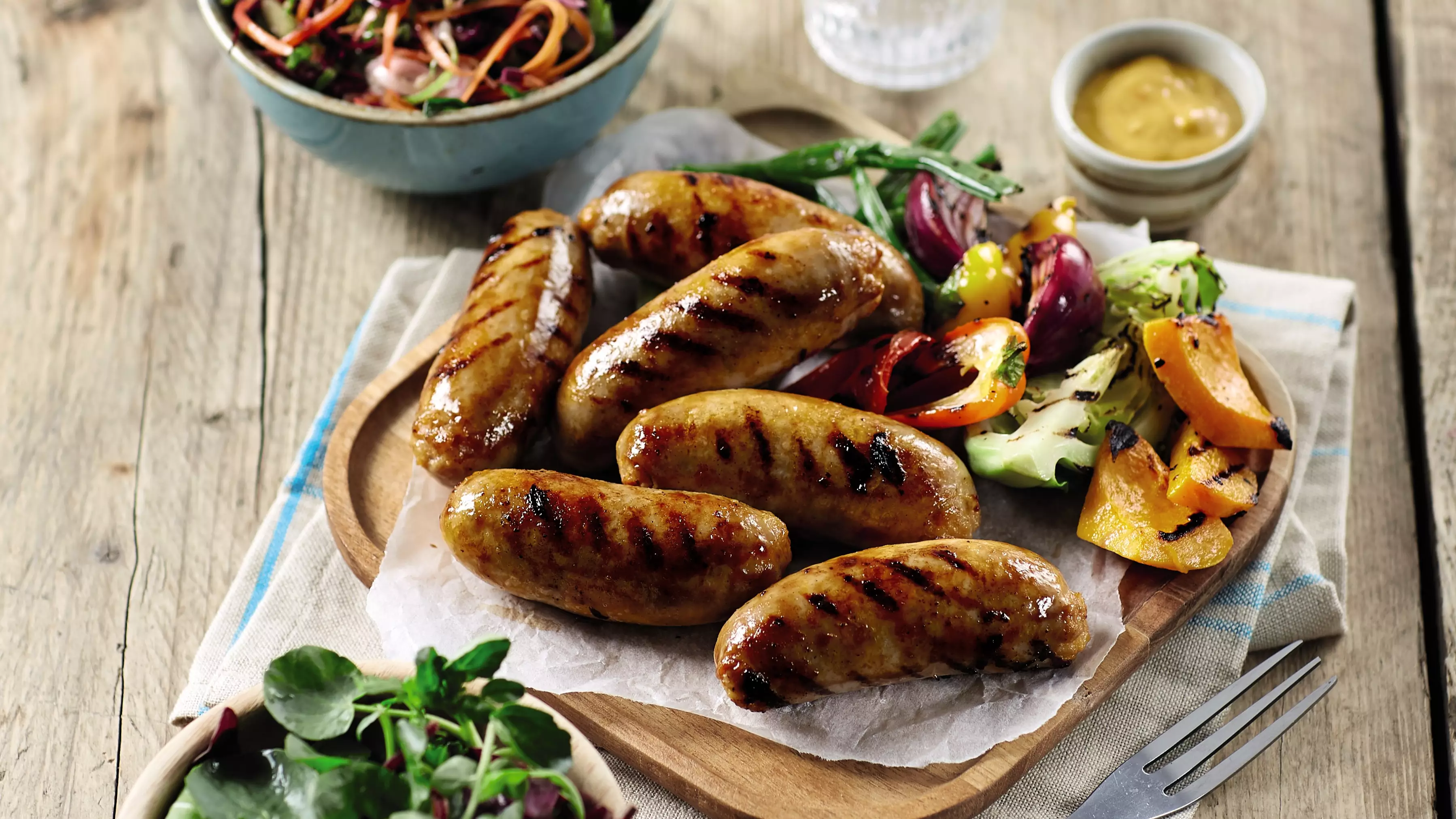 Aldi Is Launching Cheese-Filled Sausages So Don’t Pack Away Your Barbecue Just Yet