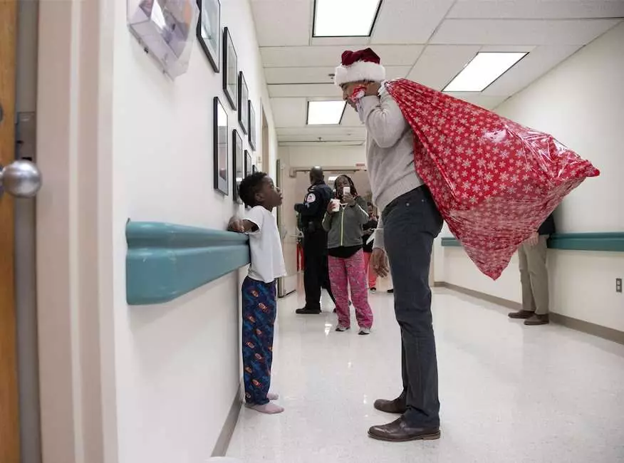 Barack Obama took to the wards with a bag full of presents. (