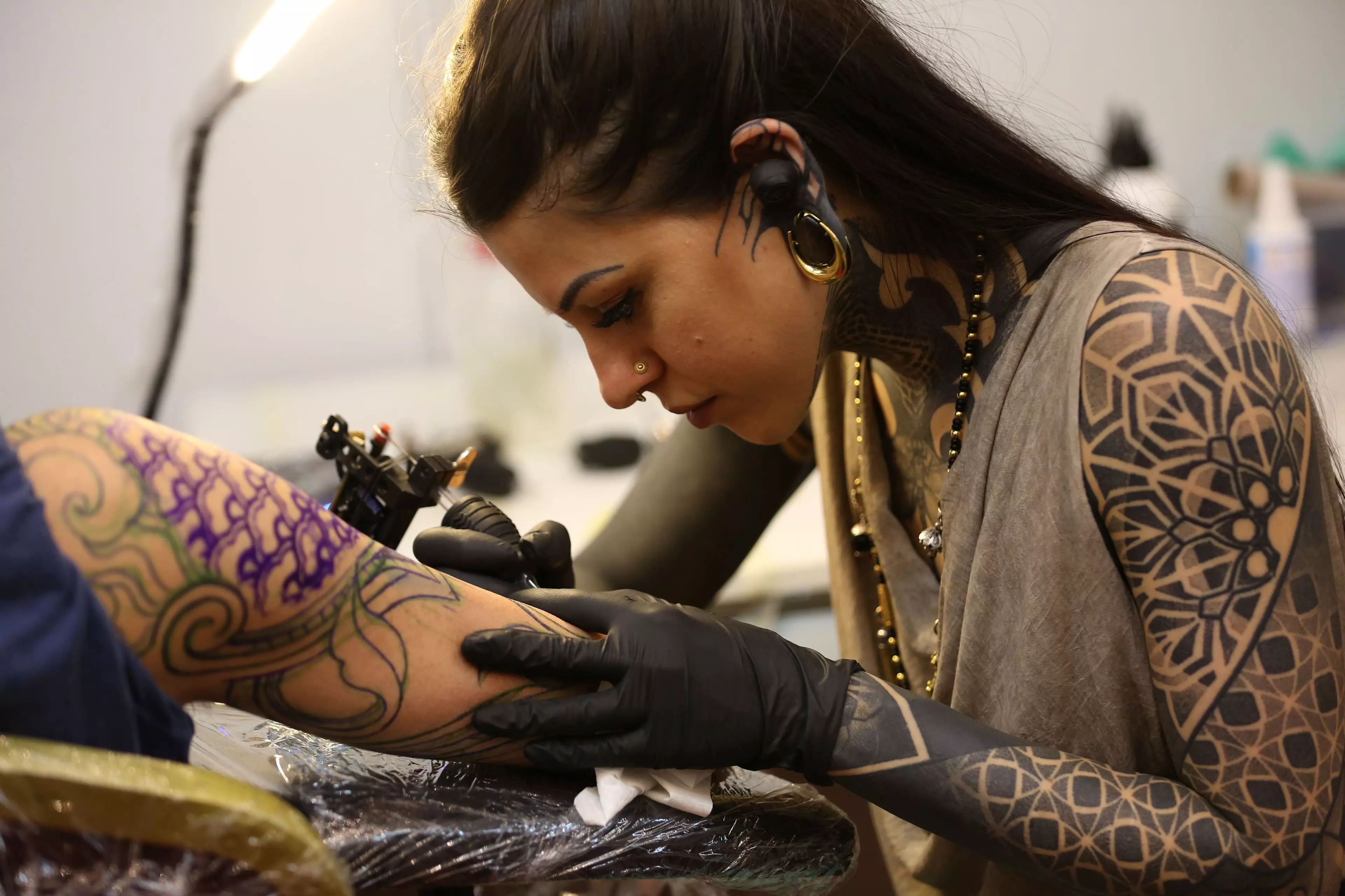 Scientists have found that a pigment used in colourful tattoos can have potentially toxic effects.