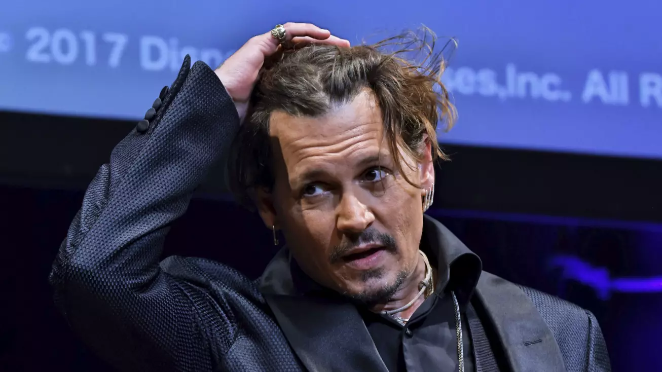 ​Johnny Depp Responds To Ear Piece And Spending Claims