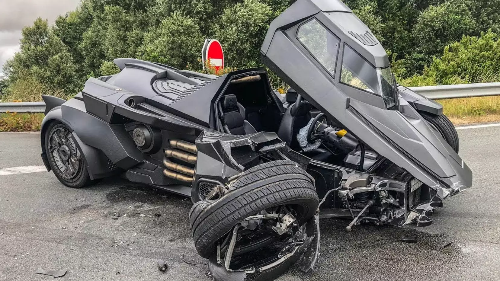 The Bat-Mobile following the collision with the other car /