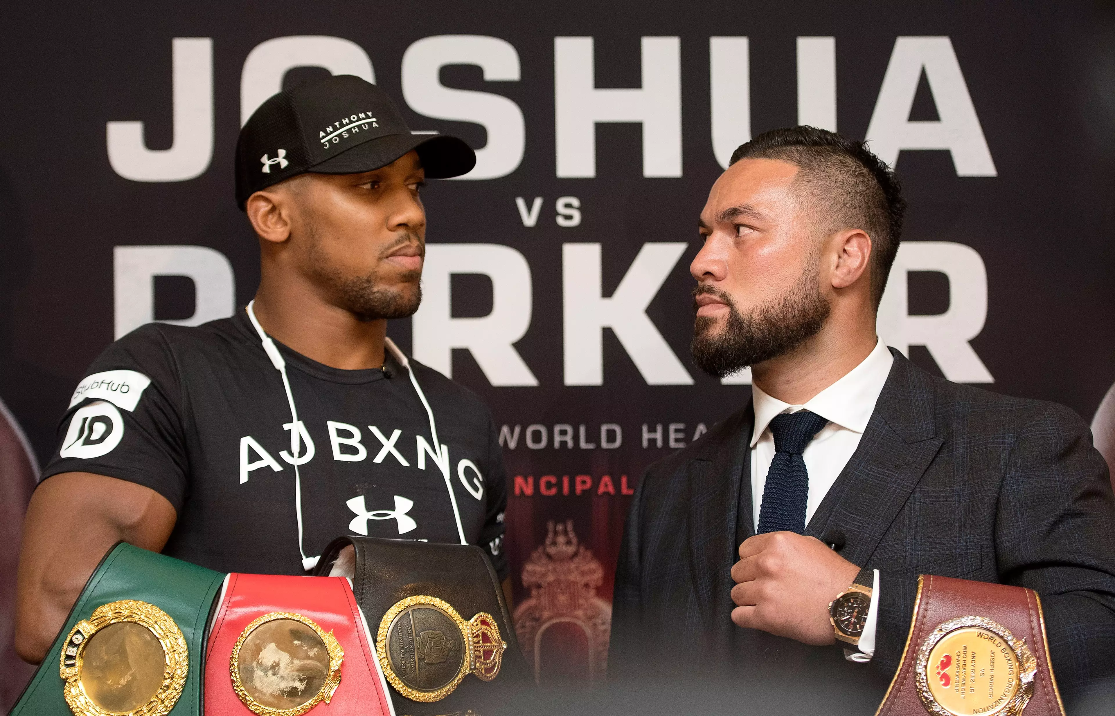 Joshua faces off against his opponent Parker. Image: PA
