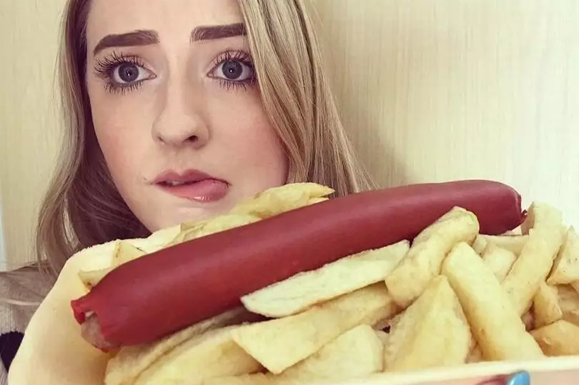 Sophie bravely tried out the saveloy.