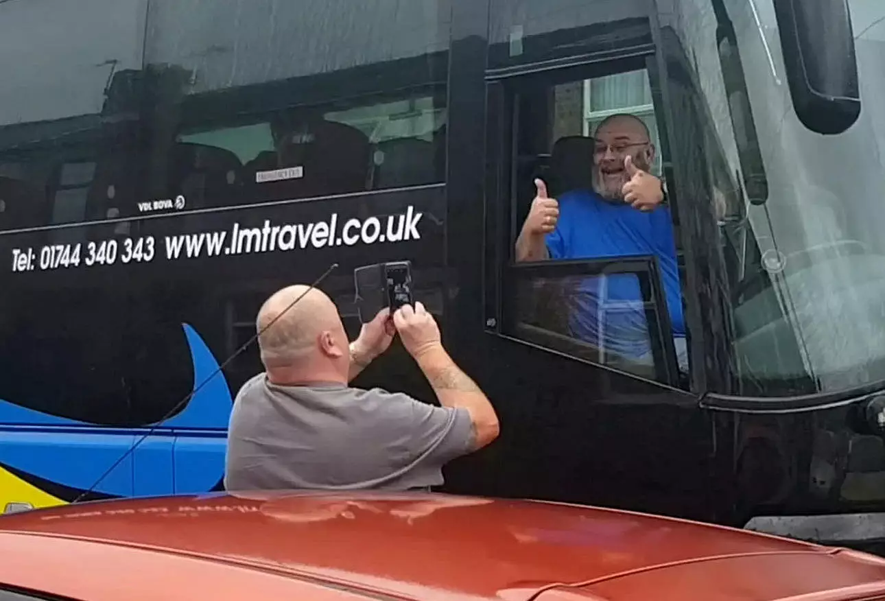 He even took photos of the coach driver.