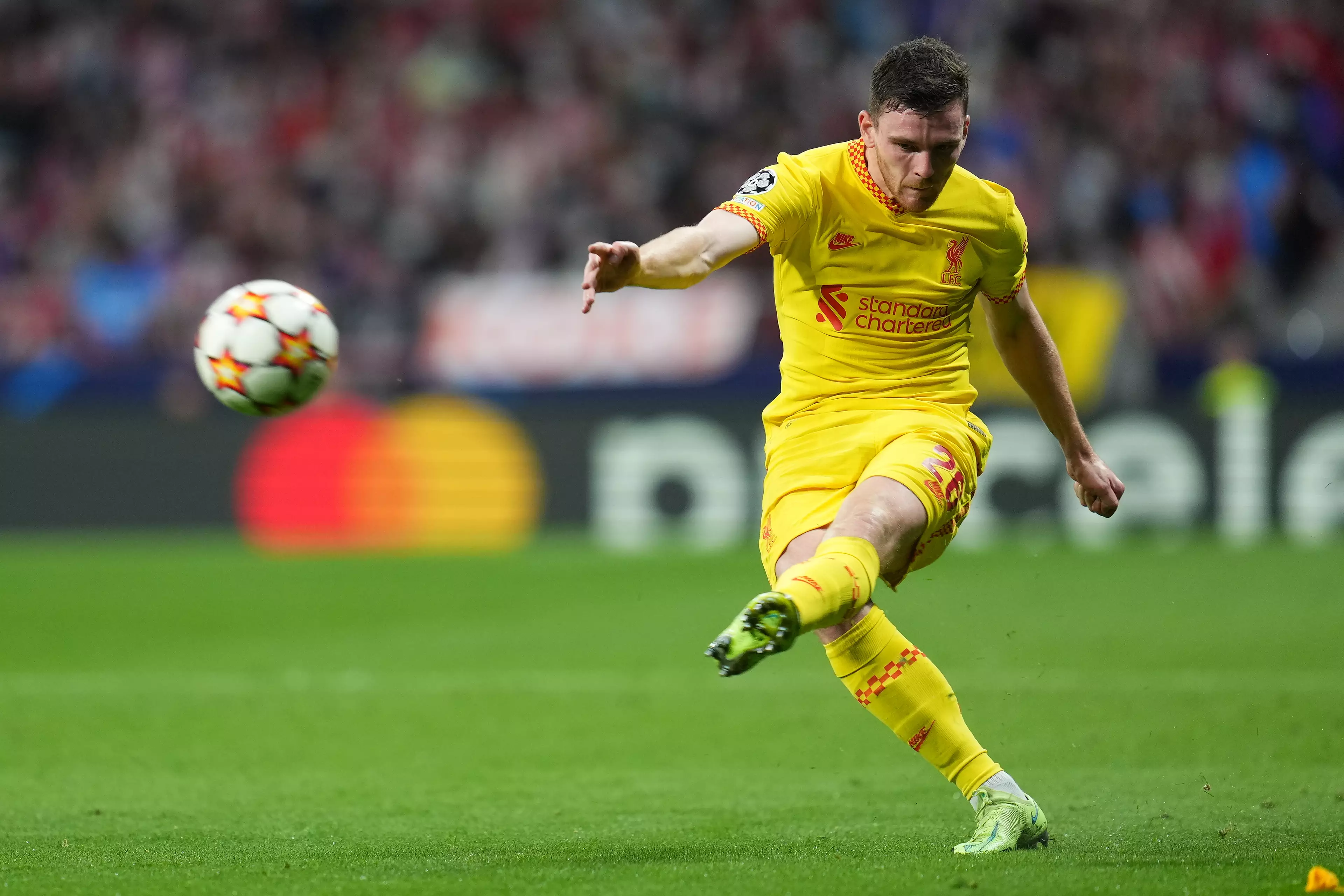 PA: Andy Robertson in action against Atletico Madrid