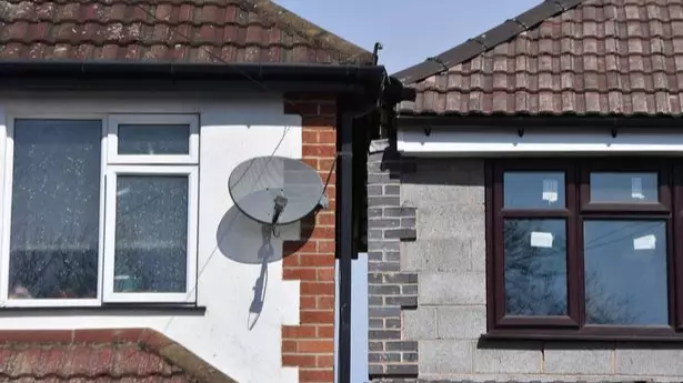 Homeowner Upset By Neighbour's Extension That Almost Touches His House