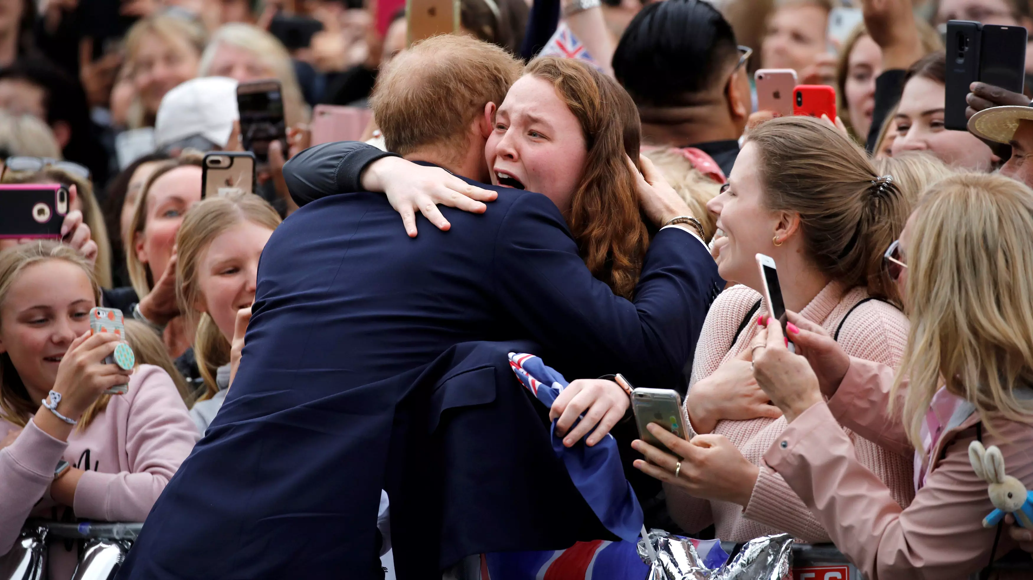 Prince Harry Tells Fan 'You're Going To Get Me Into Trouble' For Breaking Royal Protocol