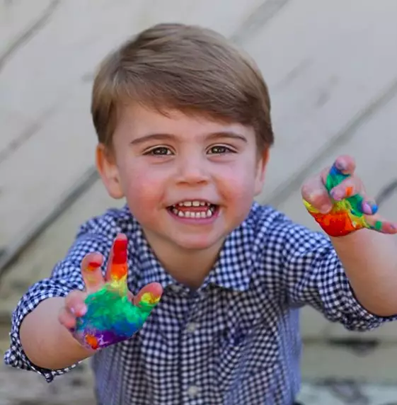 Prince Louis posed with paint on his hands (