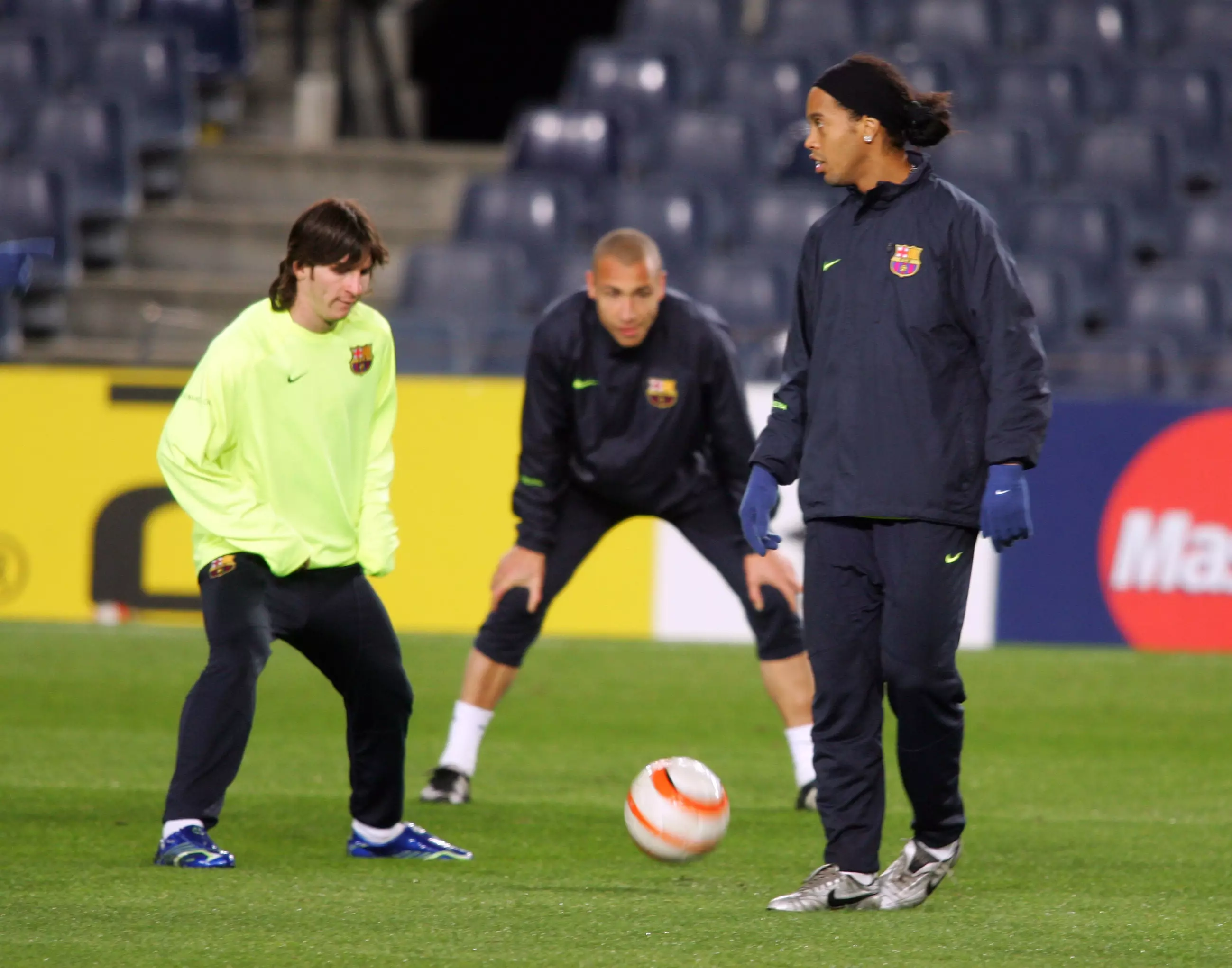 Messi and Ronaldinho during Barcelona training. Image: PA