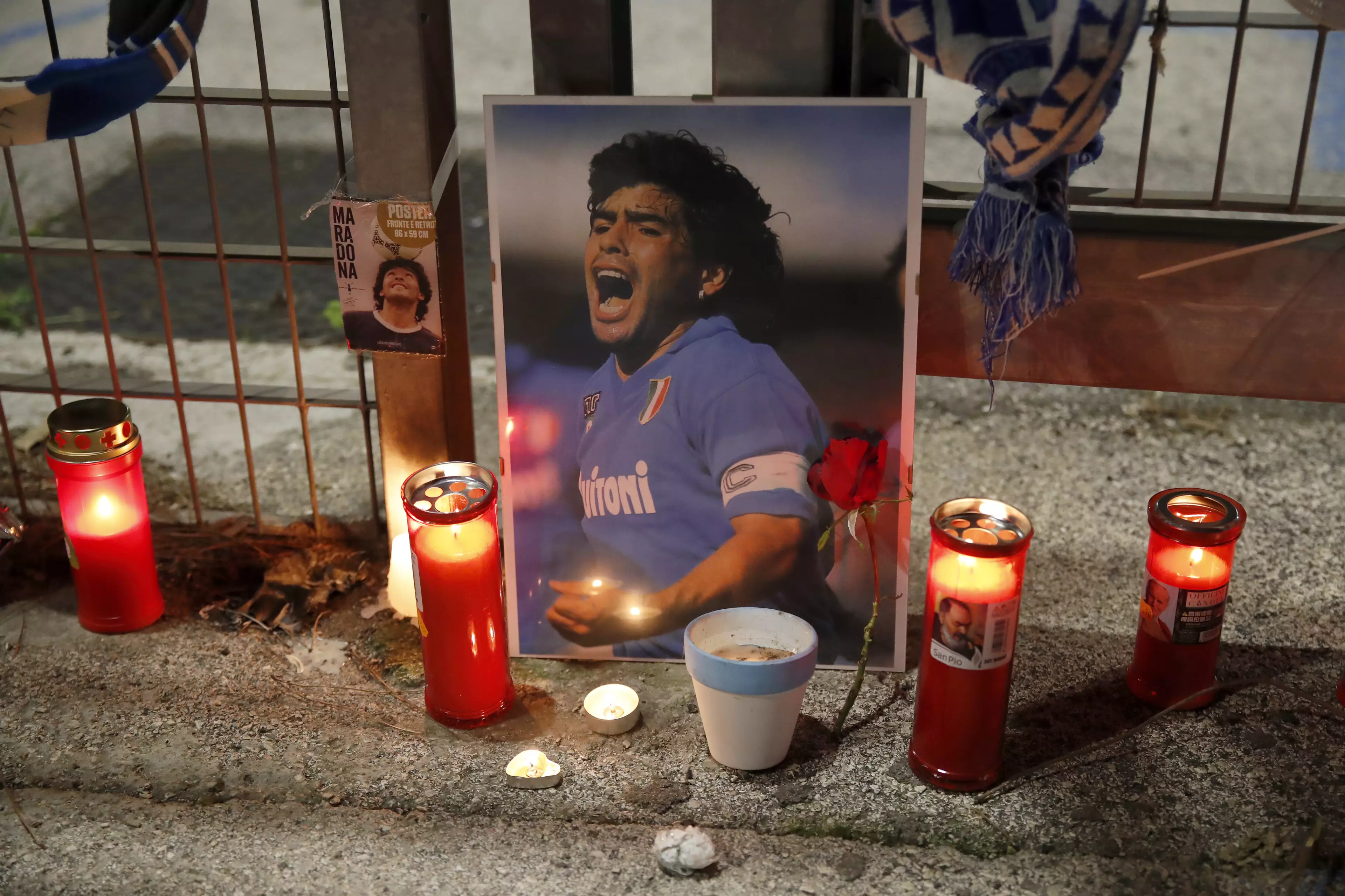 Napoli fans have paid tribute to Maradona outside the club's stadium.