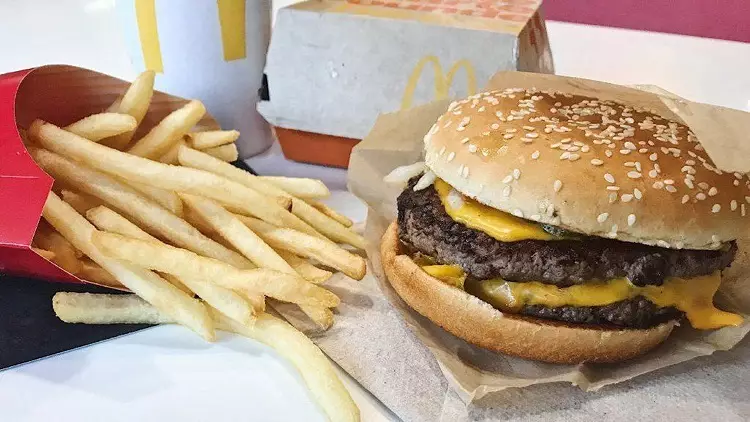 McDonald's has removed artificial colors, flavors and preservatives from its top-selling burgers.