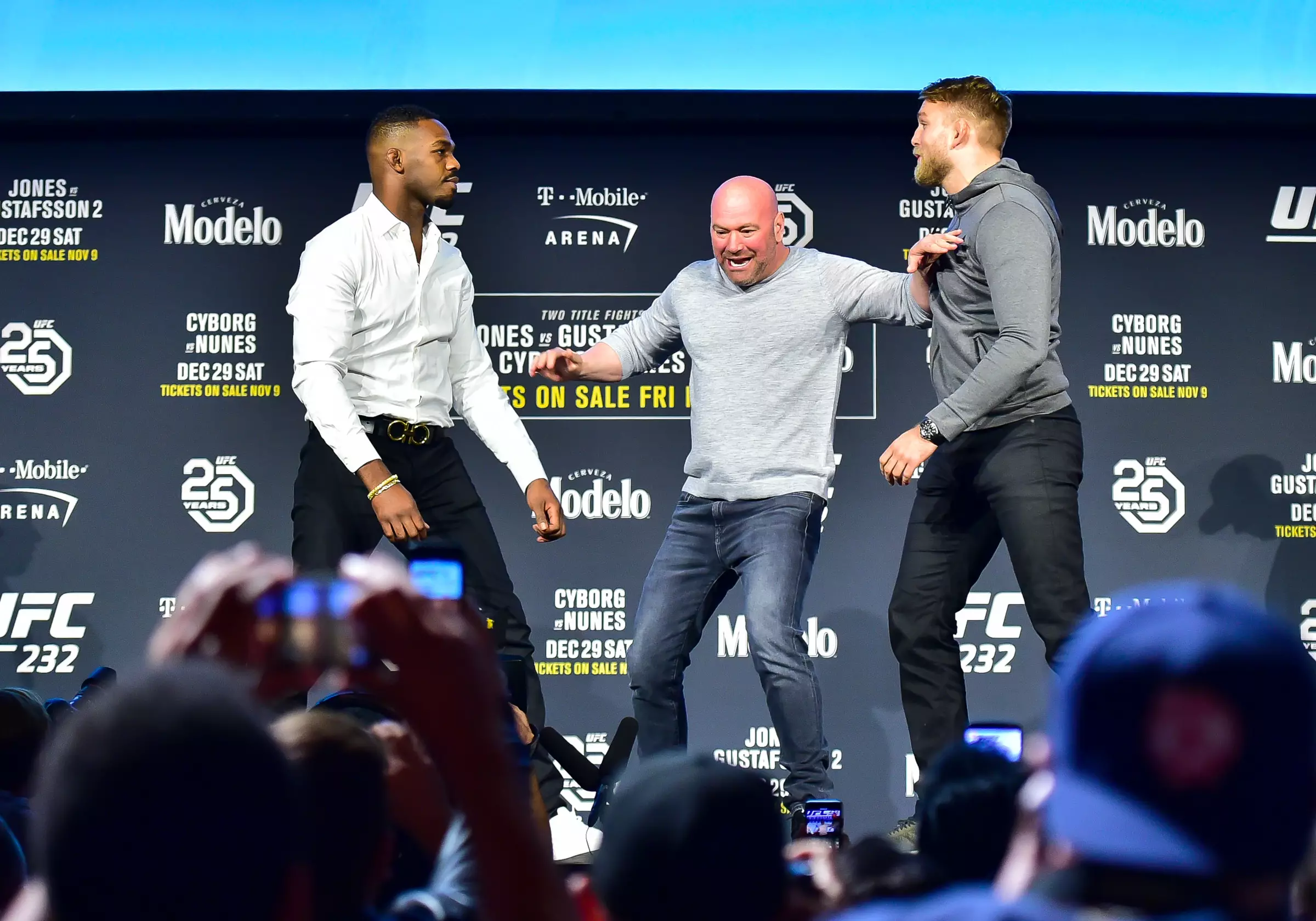 Dana White keeps the pair apart during a pre fight press conference. Image: PA Images
