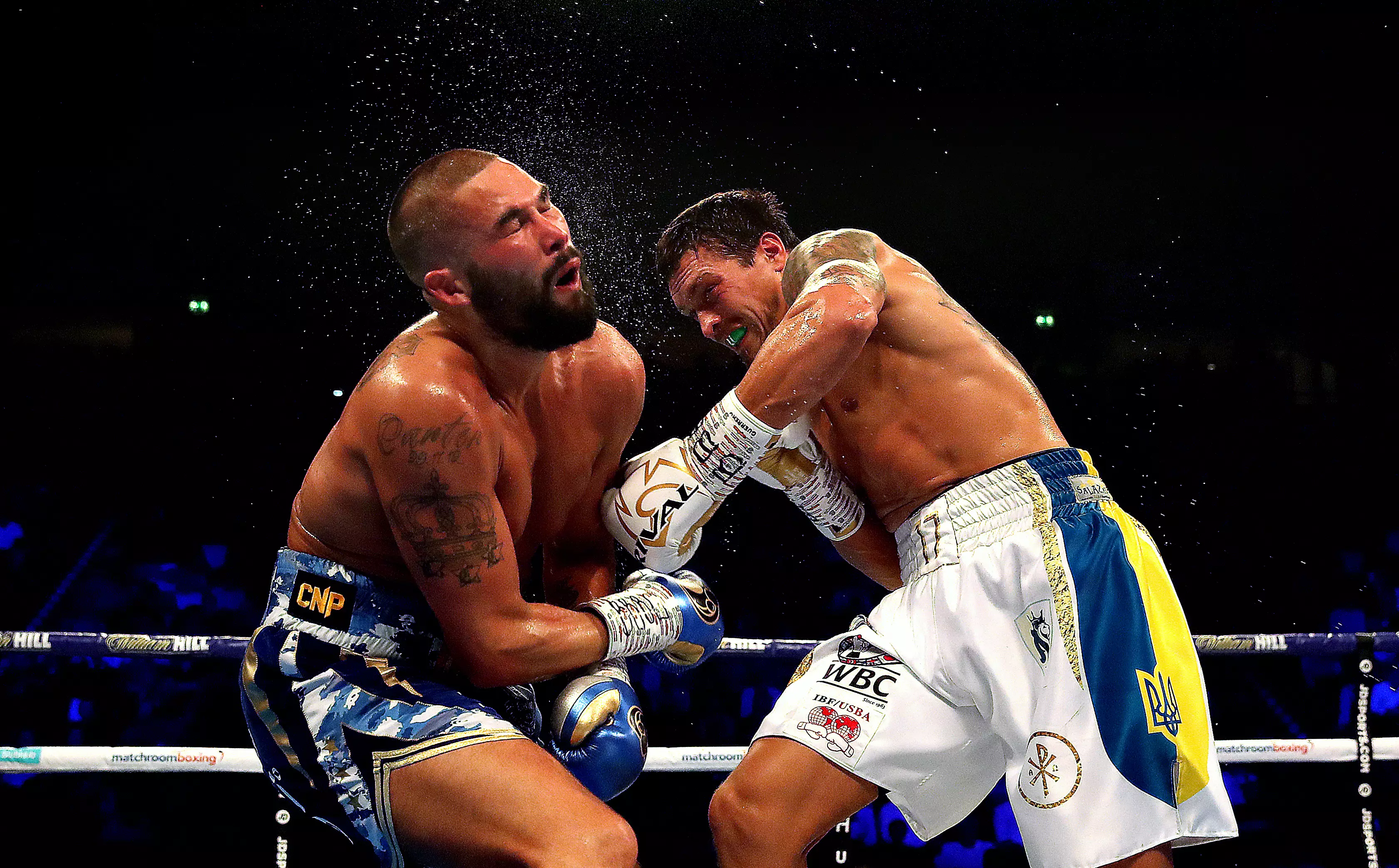 Olexandr Usyk, pictured knocking out Tony Bellew, dominated the cruiserweight division