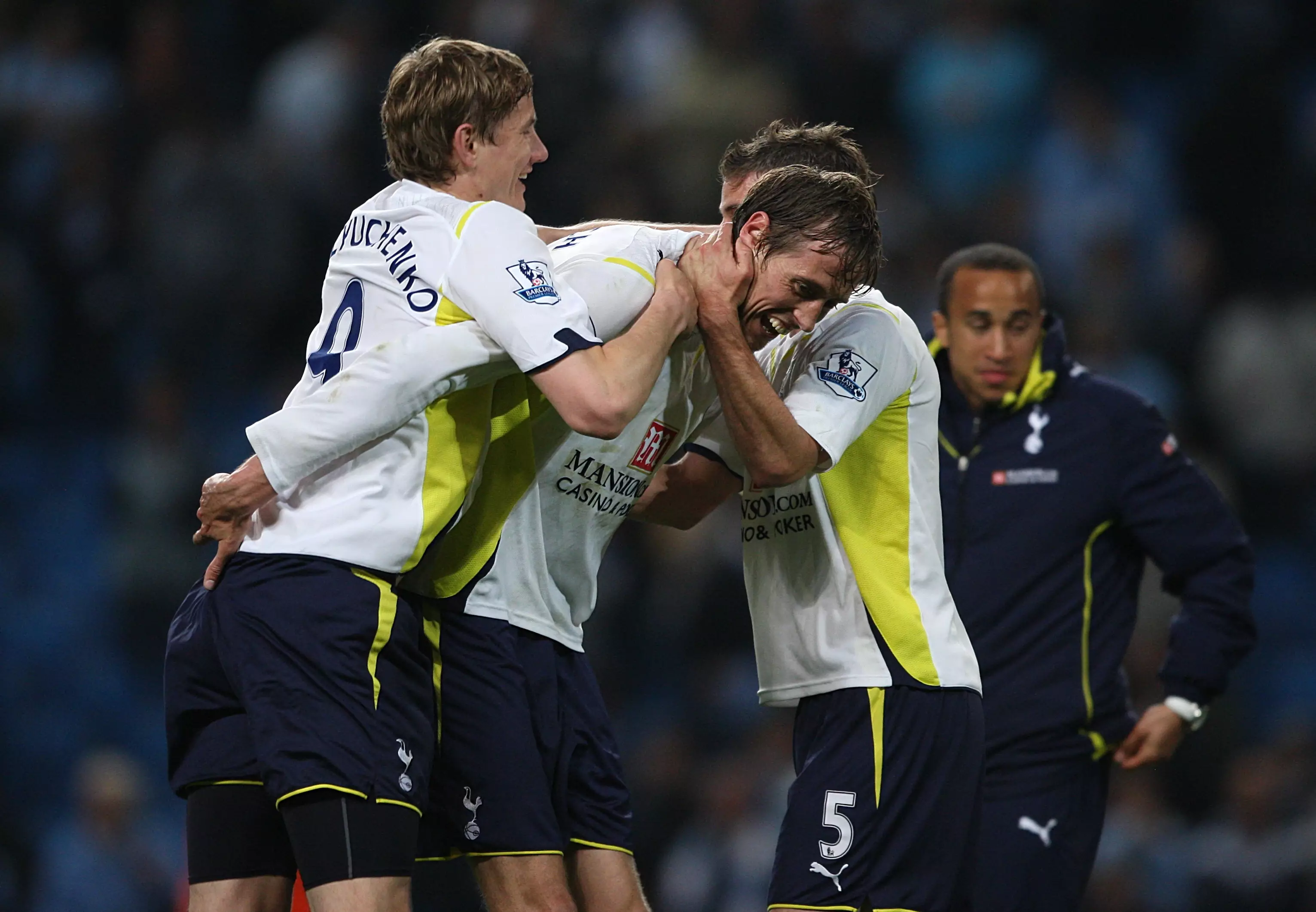 Crouch mobbed by Spurs teammates after scoring against City. Image: PA Images