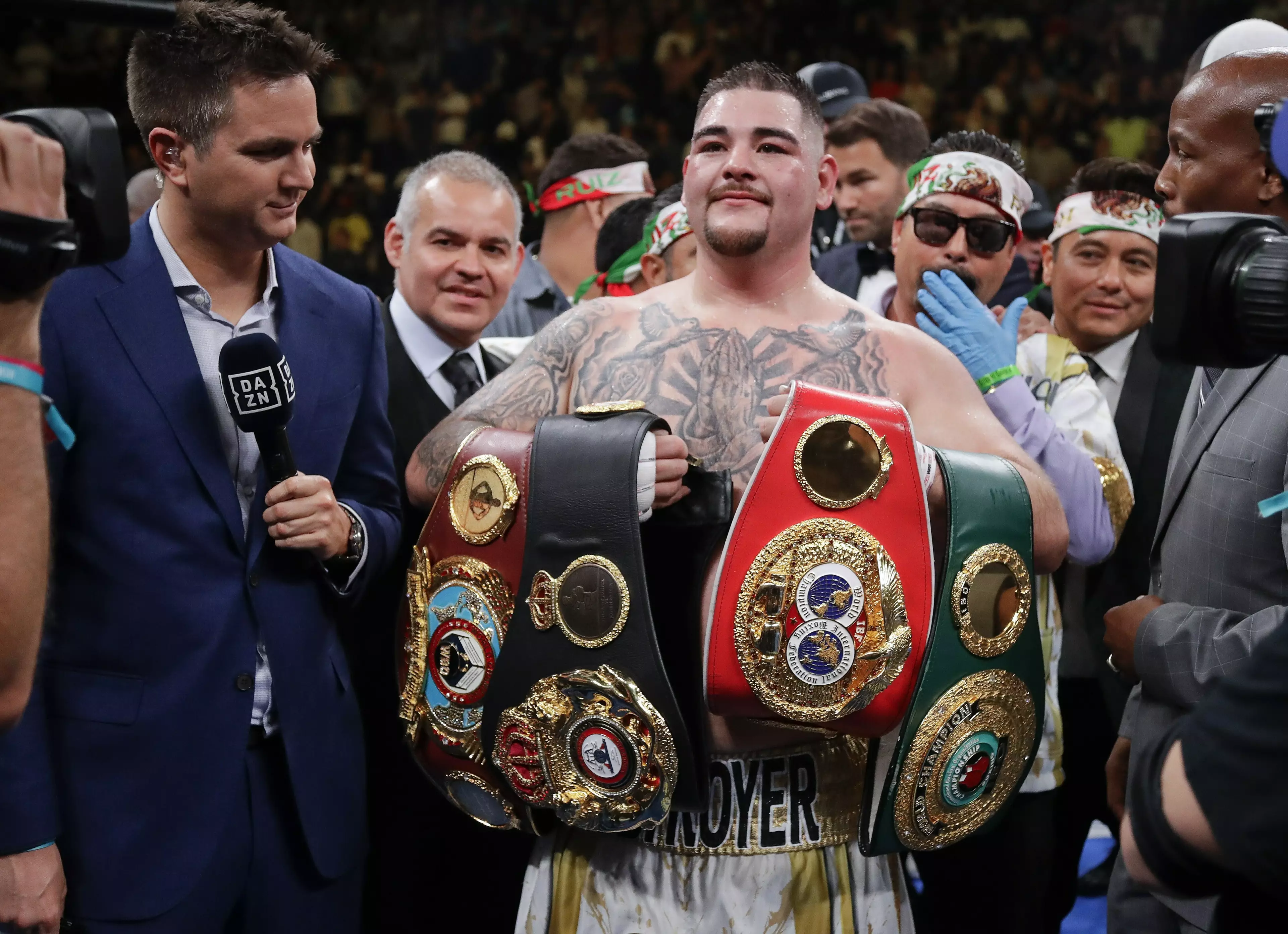 Ruiz holding all his titles. Image: PA Images