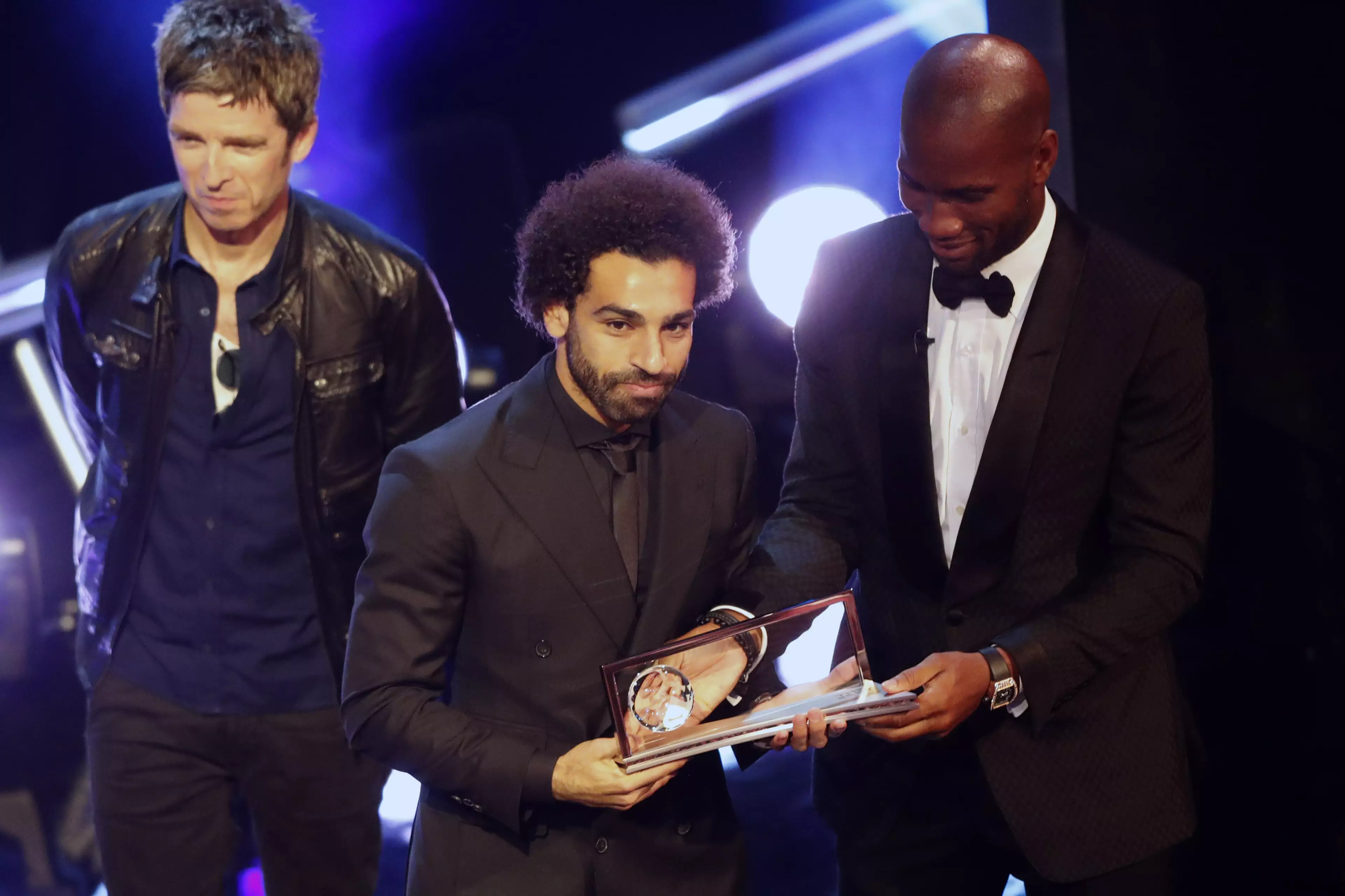 Salah with his Puskas Award. Image: PA Images