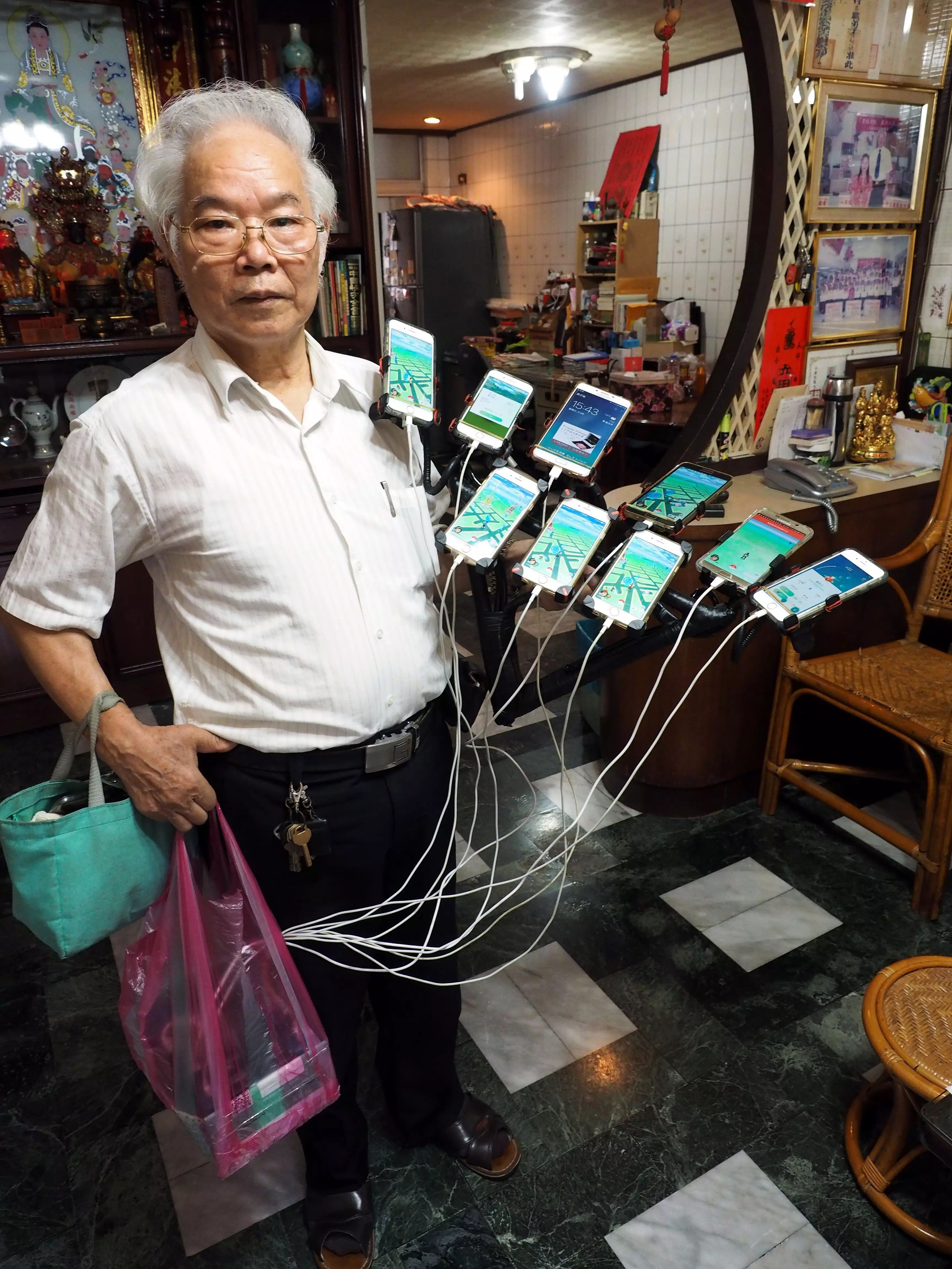 It's hard to miss Chen and his many mobiles (he has double as many now).