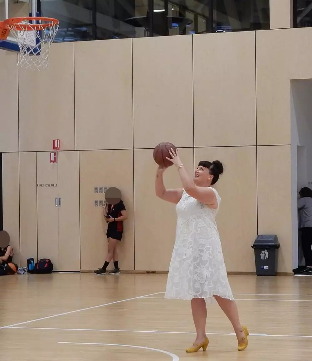 Tammy has even played sport in her gown