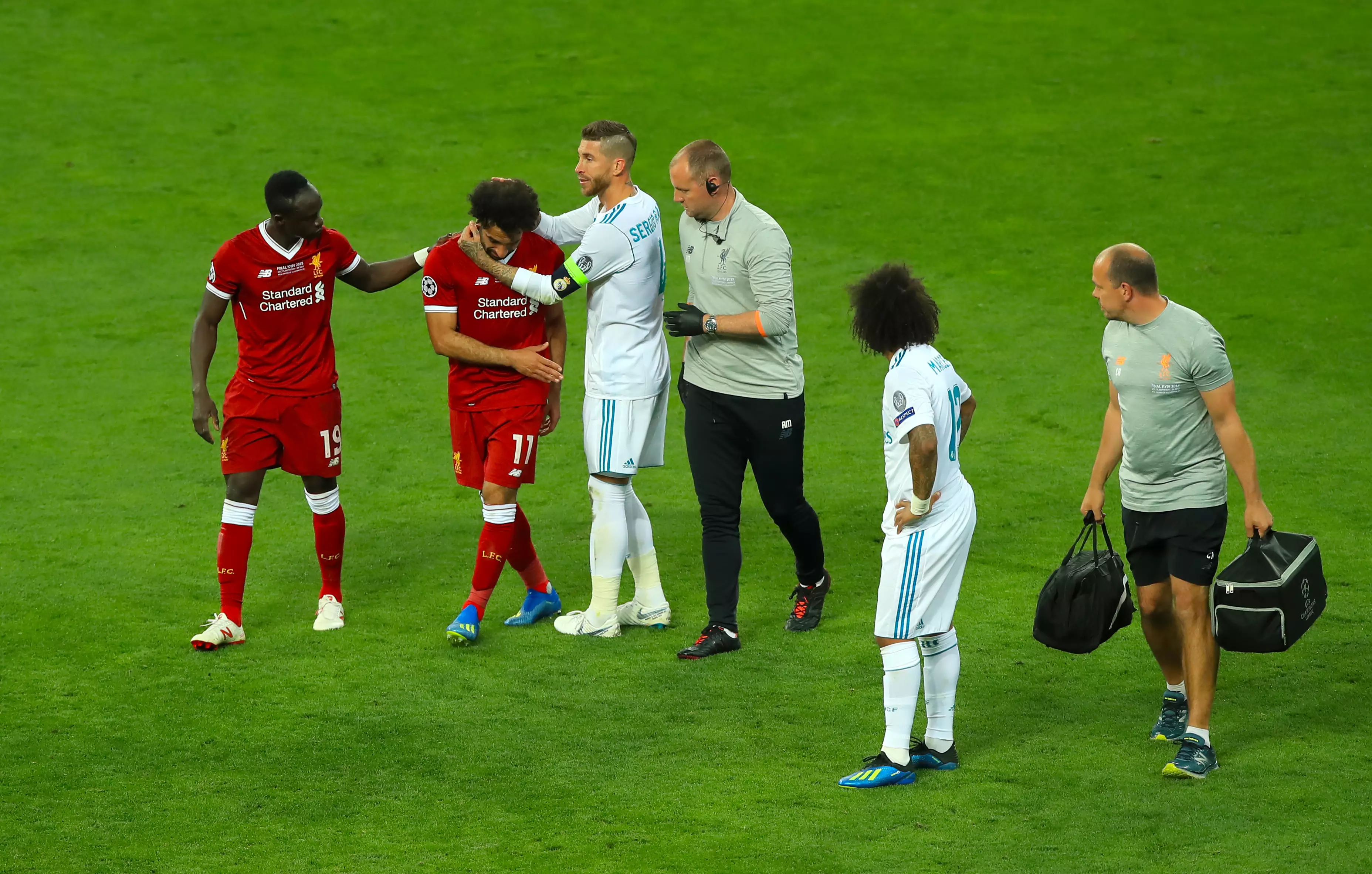 Ramo tries to embrace Salah as the Liverpool forward gets subbed off. Image: PA Images