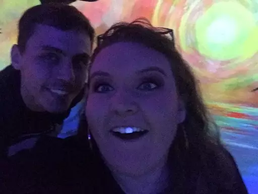 Megan Maunsell with her denture lit up by a backlight - pictured with her boyfriend Kieran Allen.