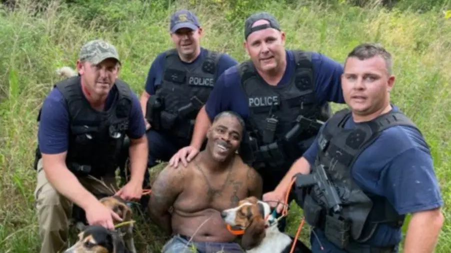 Police Spark Outrage By Posing With Suspect After Manhunt