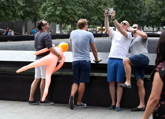 Stag-Do Causes Outrage By Taking Selfies With Blow-Up Doll At Ground Zero