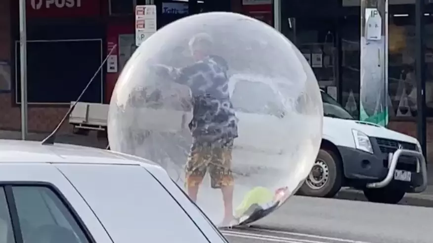 Melbourne Man Seen Walking Down The Street In A Bubble To Be Socially Distant